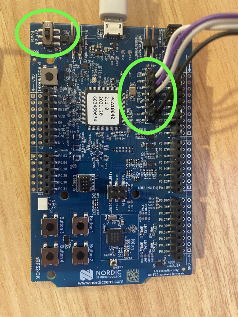 Connect the adapter cable to the pin header shown. Once connected to your computer, turn on the power switch shown.